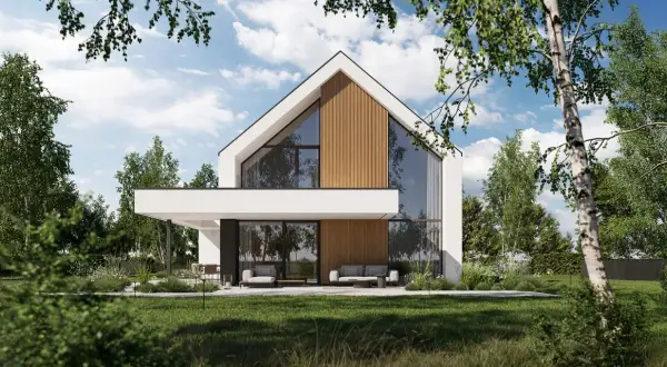 Nowoczesny dom z dużymi przeszkleniami i drewnianymi elementami, otoczony zielenią. Projekt homekoncept 130.